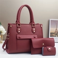 Three-piece burgundy litchi pattern tote bag set with matching pouch and card holder - Red