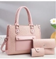 Three-piece pink embossed handbag set including tote, envelope clutch and small pouch - Pink