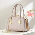 Detail of champagne glitter evening bag with geometric patterns and crystal clasp - Purple