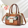 Detail of brown crocodile pattern handbag featuring a pearl buckle and stylish snake print flap - L23cm H17cm W14cm / Earthy Yellow