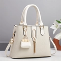 Elegant beige woven texture handbag with gold tassel and lily flower decoration - White