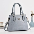 Elegant grey-blue patchwork bucket bag in matte leather with MS.ISHIANG metal logo - Blue