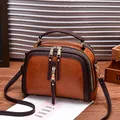 Bolso bandolera vintage bicolor café con asas superiores y correa ajustable larga - Amarillo