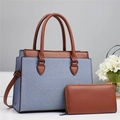 Blue and white striped tote bag and brown leather wallet set on light background - Blue