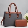 Close-up of brown leather and gray fabric tote bag with matching zipper wallet - Black
