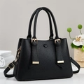 Classic black litchi pattern handbag with gold hardware and tassel accents for women - Black