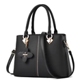 Bolso de mano clásico de cuero negro con herrajes dorados y colgante de flores - Negro