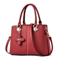 Elegant burgundy crossbody handbag for women with clover charm and detachable strap - Red