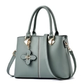 Elegant morandi green top-handle bag in matte PU leather with flower charm and studs - Green