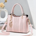 Light pink wave pattern handbag with leaf charm and adjustable shoulder strap - Pink