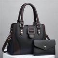 Litchi pattern faux leather handbag set with tote and clutch bag on a display stand - Black