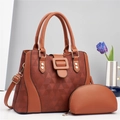 Close-up of brown tote bag set with geometric triangular texture and gold hardware details - Earthy Yellow