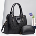 Two-piece set with black geometric embossed tote bag and matching clutch purse - Black