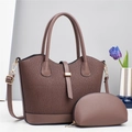 Detail of coffee brown pleated tote bag and pouch set with golden hardware and strap - Coffee
