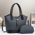 Detail of printed tote bag set with grid pattern, including a matching crescent coin purse - Black