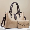 Detail view of champagne PU leather tote bag and matching wallet set with brown contrast trim - Khaki