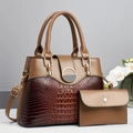 Close-up of two-piece tote bag set in brown faux leather with crocodile texture detail - Main Bag and Pouch / Khaki
