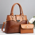 Detail of brown crocodile pattern patchwork handbag with matching pouch and metal buckle - Main Bag and Pouch / Earthy Yellow