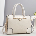 Chic beige crossbody handbag with stylish pleated leather texture and gold lock hardware - Off White