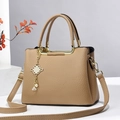 Elegant khaki lychee grain tote bag with pearl Chinese knot tassel and gold hardware - Khaki