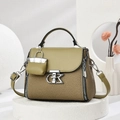 Elegant khaki and olive green patchwork bucket bag with CK logo and woven texture - Green