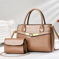 Detail of stone-pattern handbag set with gold hardware and chain strap in light brown - Khaki