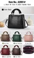 Detail of crocodile embossed shoulder bag with dimensions 26cm x 12cm x 20cm - Standard Size