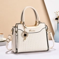 Elegant beige woven texture handbag with golden clover charm and metal brand logo - Off-white