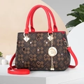 Detailed close-up of dark brown plaid texture and star charm on the tote bag - Red Checkered