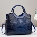 Deep blue crocodile embossed leather tote bag with gold hardware and top handle - Blue