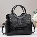 Elegant black crocodile pattern tote bag with gold hardware and top handle strap - Black