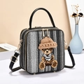 Fashionable striped crossbody bag with teddy bear decor and silver woven texture - Black