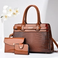 Three-piece brown lizard texture tote bag set with glossy finish and gold metal hardware - Earthy Yellow