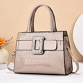 Beige crocodile-embossed handbag with a sparkling rhinestone buckle and top handle - Khaki