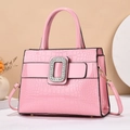Pink crocodile pattern handbag with large diamond-encrusted buckle and top handle - Pink