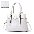 White faux crocodile leather handbag with glossy texture and adjustable shoulder strap - White