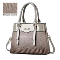 Grey glossy patent leather handbag with embossed faux lizard texture and shoulder strap - Gray