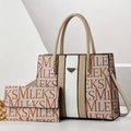 Detailed close-up of beige contrast handbag with printed pattern and triangle logo - Khaki