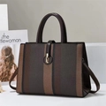 Fashionable vertical stripe tote bag with leather trim and gold buckle closure - Coffee