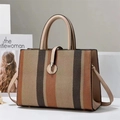 Fashionable large capacity striped tote bag with leather handles and gold metal clasp - Khaki