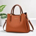 Brown lychee leather tote bag with round handles and adjustable strap for women - Khaki/Earth Yellow