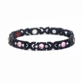Dettaglio del bracciale magnetico nero con strass rosa e magneti interni per terapia - Nero con zirconia rosa