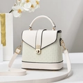 Chic beige bucket bag with woven panel detail, gold hardware, and detachable shoulder strap - White