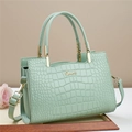Elegant mint green crocodile embossed tote bag with gold handles and a crossbody strap - Mint Green