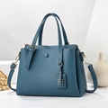 Elegant deep blue lychee pattern leather tote bag with gold hardware and shoulder strap - Blue