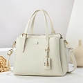 Chic beige litchi pattern leather handbag with gold hardware and adjustable strap - Off White