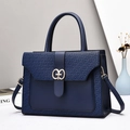 Elegant navy blue structured tote bag with geometric pattern and gold hardware decoration - Blue
