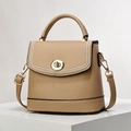 Khaki pebbled leather bucket bag with decorative white beads and gold twist lock - Khaki