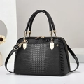 Elegant black lizard pattern faux leather handbag with gold hardware and top handles - Black