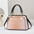 Elegant lizard embossed tote bag with black handles and detachable shoulder strap in pink - Pink